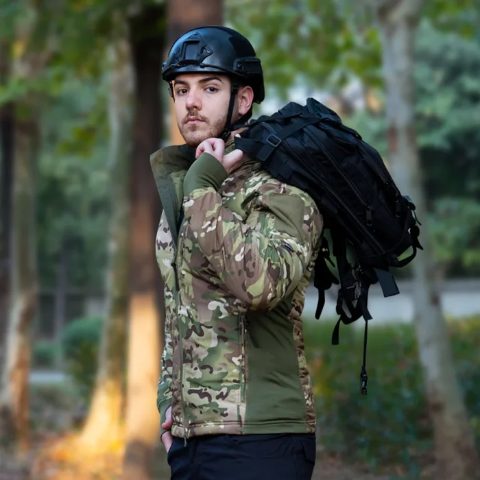 Model in CP camouflage tactical winter jacket with insulated design. Perfect for outdoor adventure, military gear, and winter tactical operations.