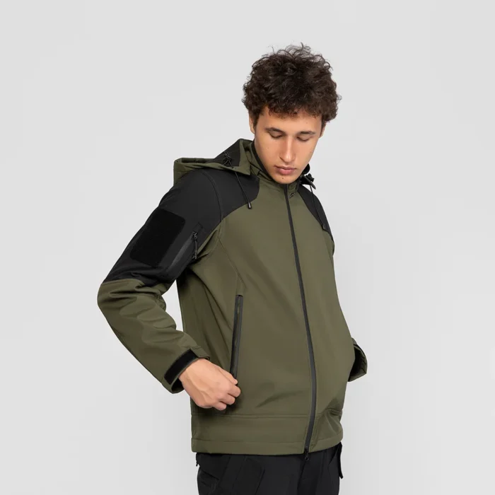 Durable army green fall jacket for men, outdoor softshell with hood, windproof and water-resistant. Ideal for autumn hiking and tactical use.