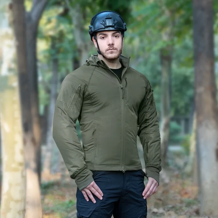 Model wearing army green tactical winter jacket. Designed for warmth, wind protection, and mobility, ideal for outdoor missions and winter training.