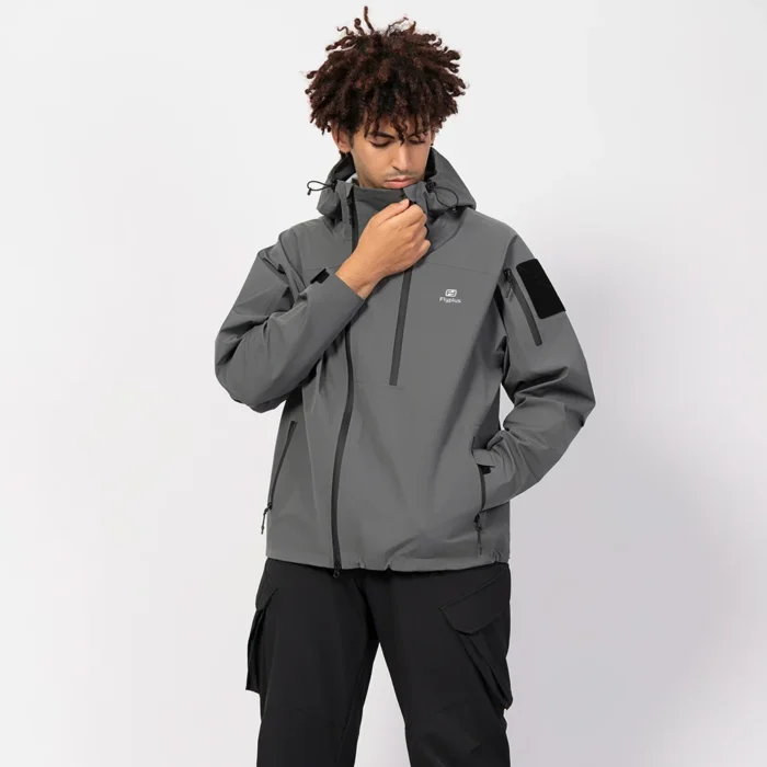 Lightweight gray hardshell jacket built for all-weather protection. Waterproof, windproof, and breathable, perfect for spring and fall outdoor use.