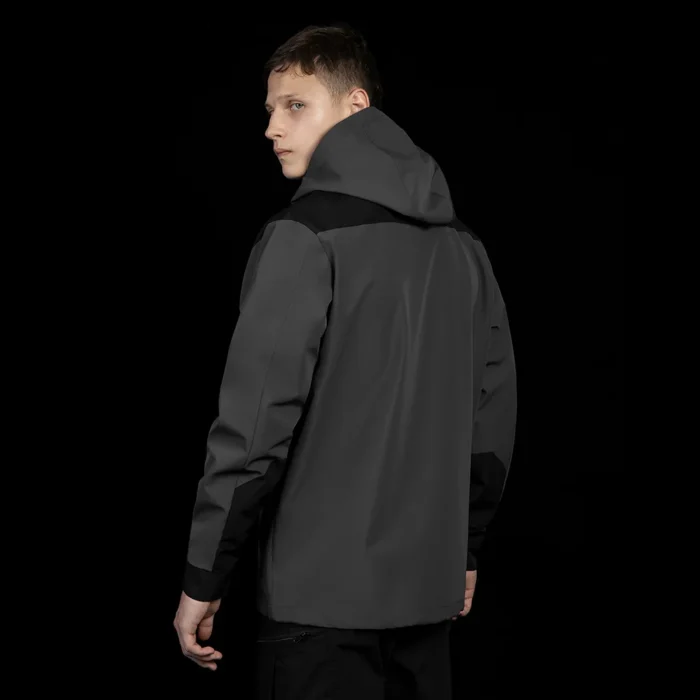 Back view of mens hardshell jacket in grey color. Waterproof and windproof design for outdoor hiking, camping, and tactical use.