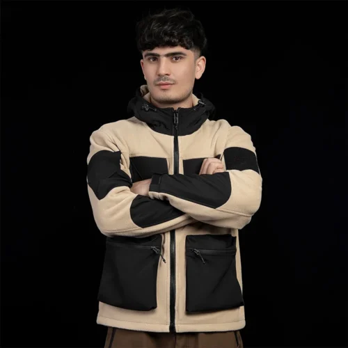 Front view of men’s khaki and black polar fleece jacket. Multi-pocket design, soft fleece warmth, and windproof hood for outdoor comfort.