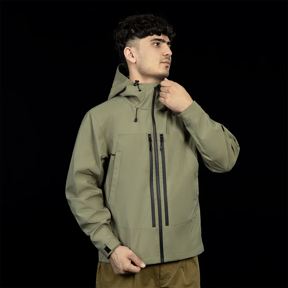 Lightweight men’s waterproof jacket designed for outdoor activities. Features adjustable hood, waterproof zippers, and durable windproof fabric.