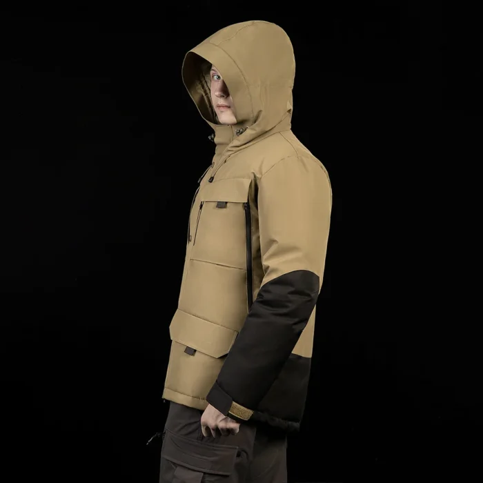 Side view of men’s waterproof down jacket in khaki with black sleeve contrast. Designed for wind and rain protection in cold weather.