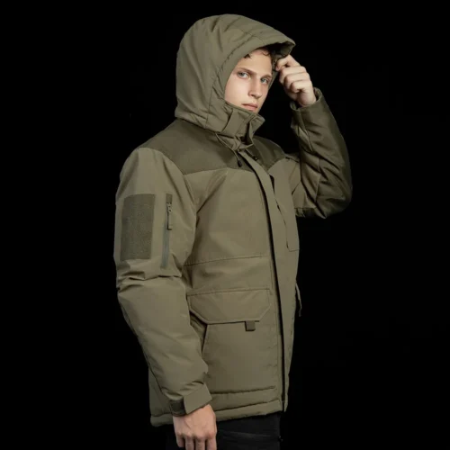 Hooded winter tactical coat with high collar and reinforced shoulder panels. Durable, windproof, and warm for tactical or outdoor use.