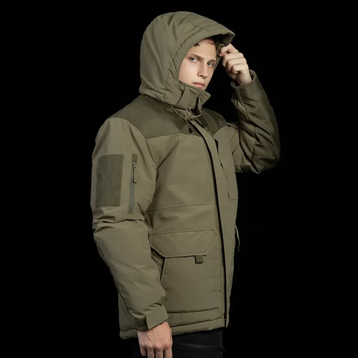 Hooded winter tactical coat with high collar and reinforced shoulder panels. Durable, windproof, and warm for tactical or outdoor use.
