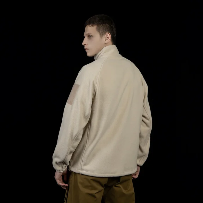 Back view of men’s polar fleece jacket in khaki color. Lightweight, breathable, and warm for outdoor tactical activities.