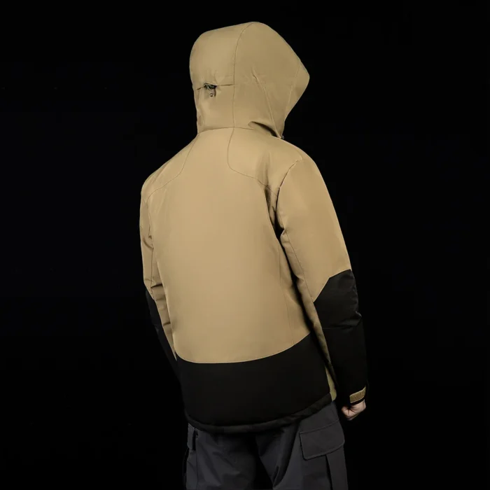 Back view of men’s waterproof down jacket featuring durable khaki shell with black contrast panels. Ideal for outdoor winter wear.