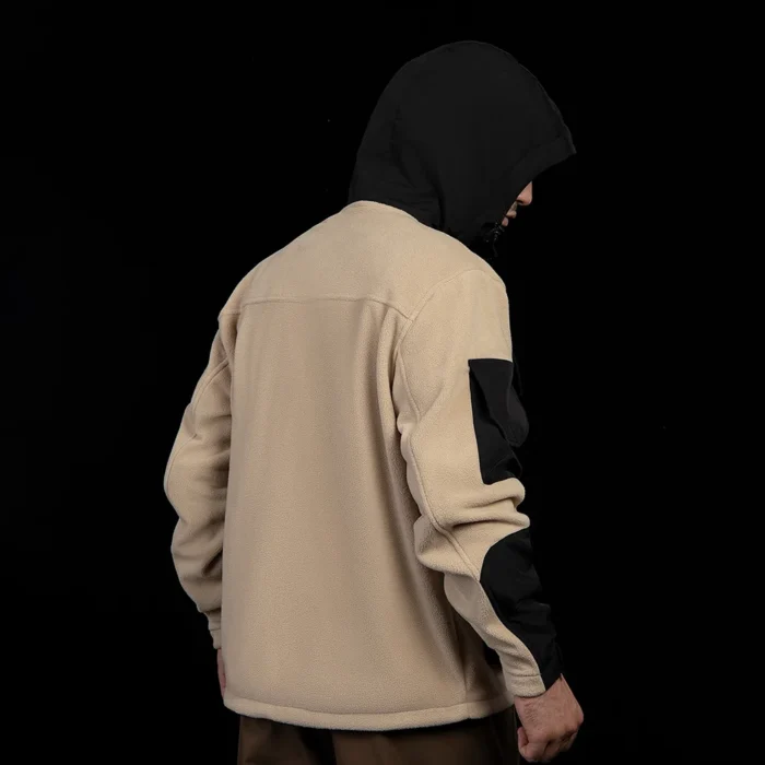 Back view of men’s polar fleece jacket in khaki and black. Soft fleece fabric and durable panels for extra protection.