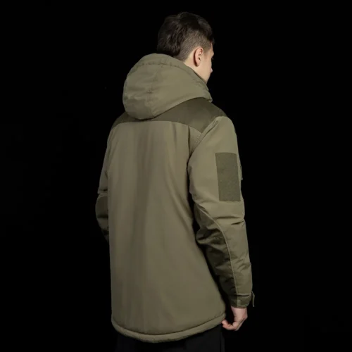 Back view of army green winter tactical coat featuring hooded design and reinforced shoulders. Built for cold weather and outdoor operations.