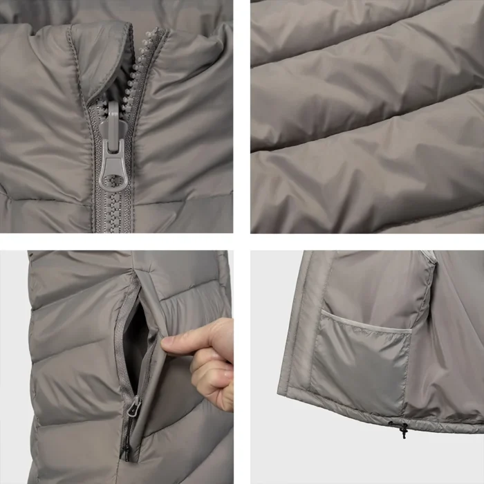 Close-up details of gray down vest showing zipper, pocket, and stitching. Designed for durability, warmth, and mobility.