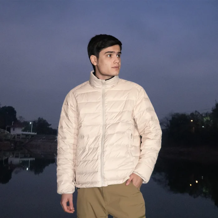 Lightweight white inner liner of 3 in 1 waterproof jacket. Can be worn separately or combined with the outer shell for full weather protection.