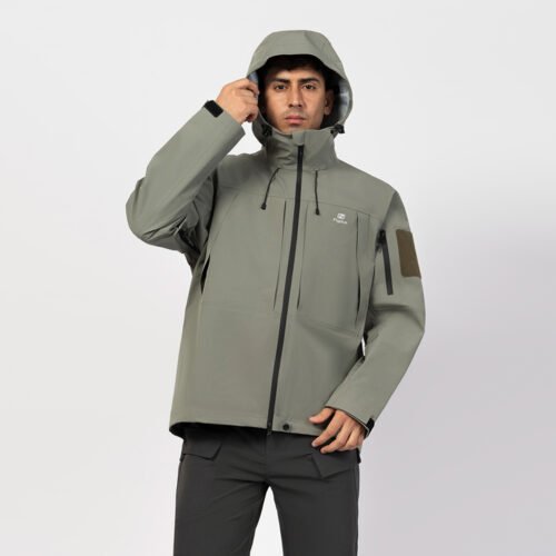 Olive green waterproof shell jacket with hooded design and reinforced seams. Lightweight, durable, and perfect for hiking, trekking, or tactical wear.