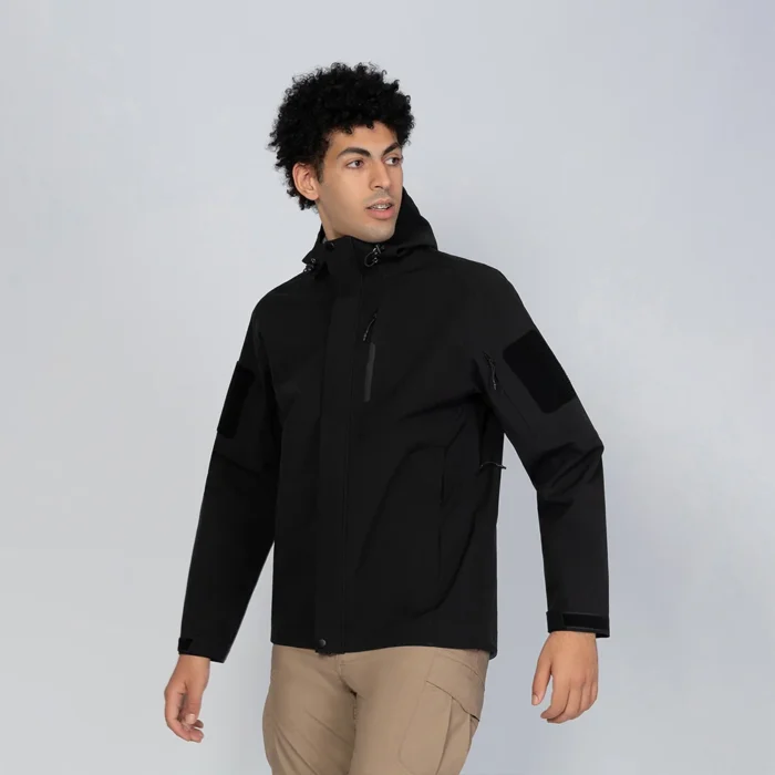 Men’s black waterproof windproof jacket featuring sealed seams and reinforced zippers. Designed for reliable rain and wind protection.