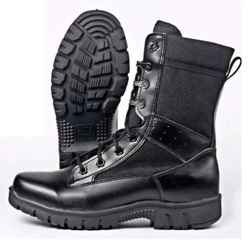 Display of black combat boots showing rugged sole and reinforced stitching, built for durability and traction in tough environments.