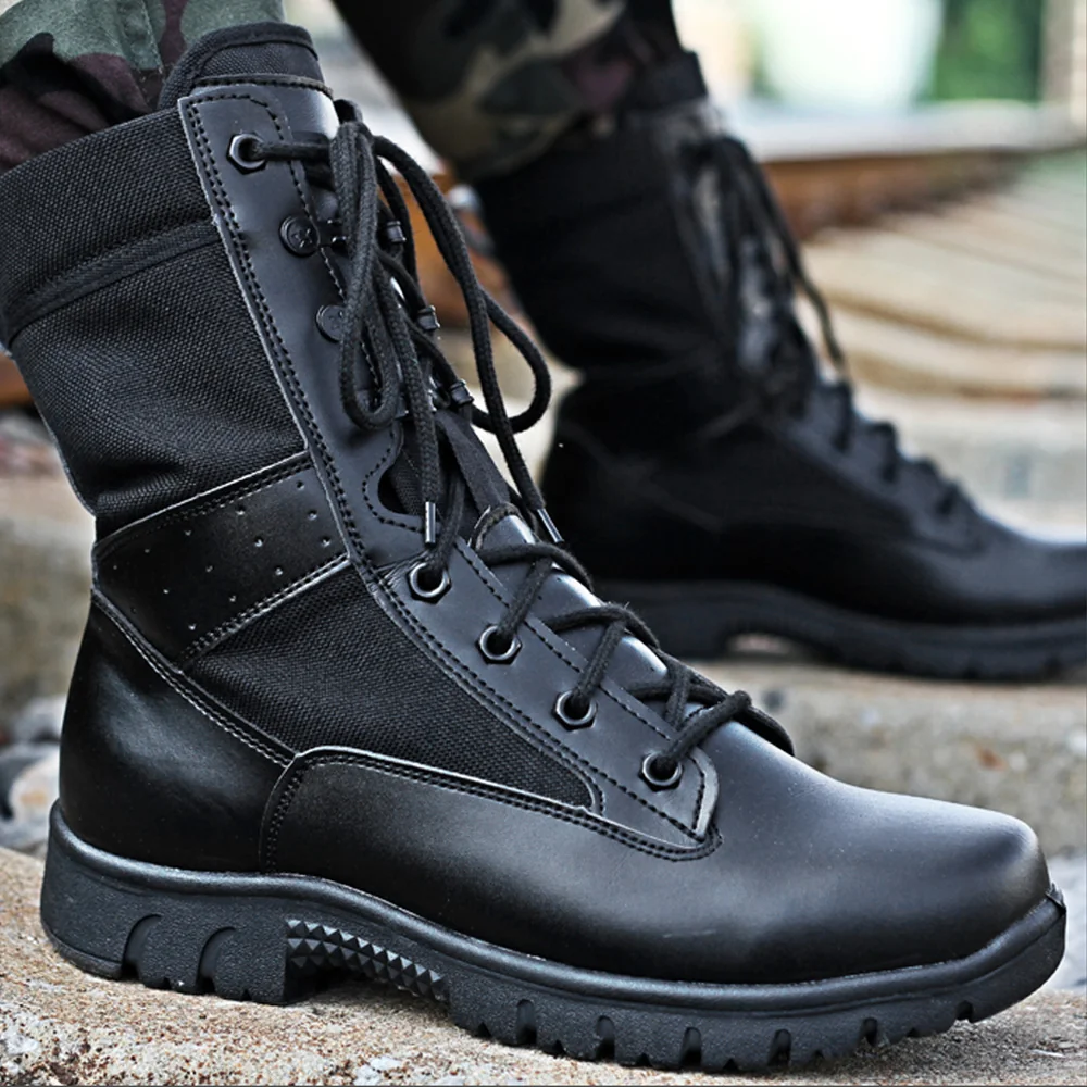 Side view of black combat boots featuring tough leather upper, breathable nylon panels, and anti-slip outsole for outdoor or army wear.