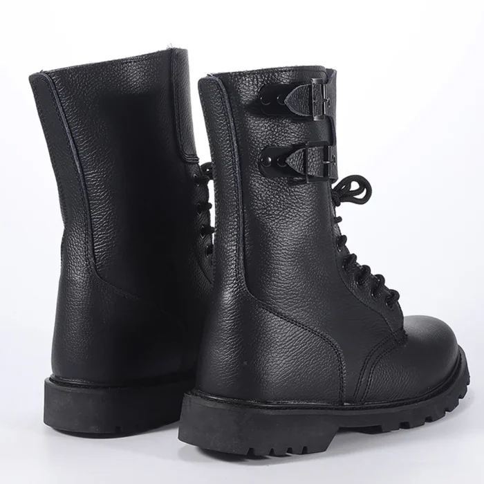 Back view of leather combat boots showing high-cut design with double buckle straps for secure fit and ankle support.