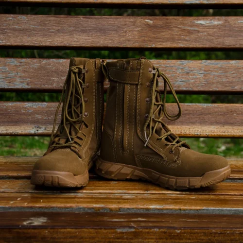 Tan military boots with lace-up design and side zipper, made of durable suede and nylon fabric for tactical and outdoor missions.
