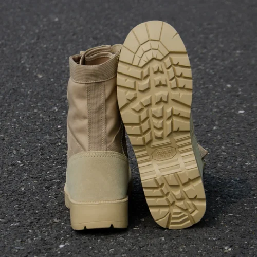Back and outsole view of army combat boots showing rugged tread pattern and reinforced heel for reliable traction in any terrain.