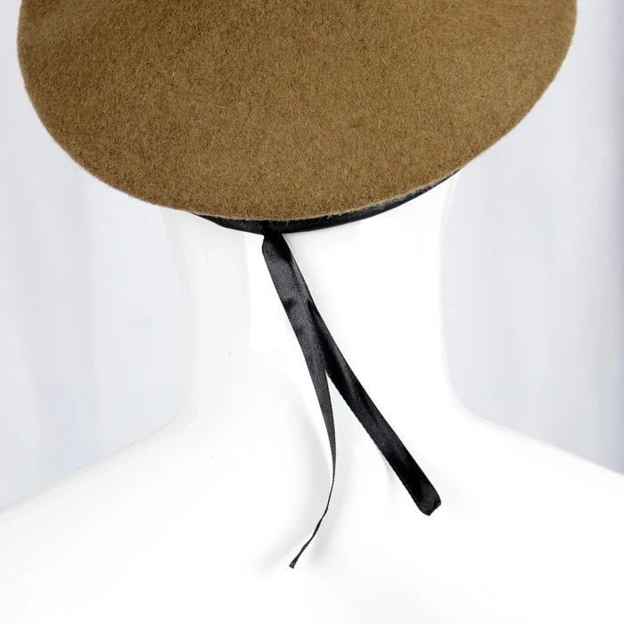 Back view of a wool military beret showing the adjustable tie strap for a secure and customizable fit.