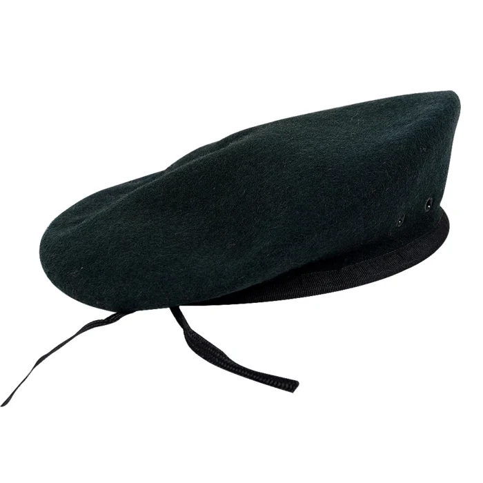 Side view of a dark green wool military beret with breathable eyelets and reinforced edge binding for tactical use.