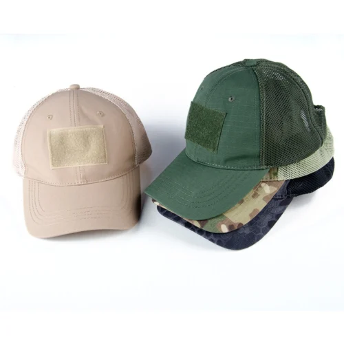Khaki and army green tactical ball caps with front Velcro patch and breathable mesh panels. Durable ripstop design for field training and outdoor missions.