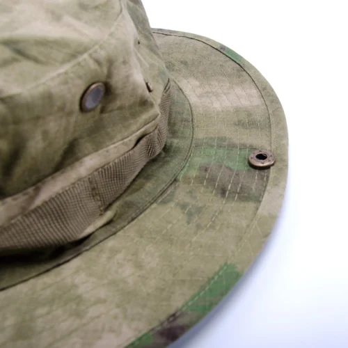 Side detail of a military LCP boonie hat with metal eyelets and reinforced brim stitching. Suitable for tactical gear suppliers and OEM customization.