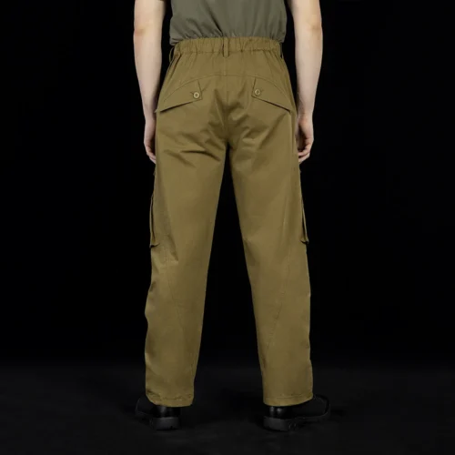 Back view of outdoor cargo pants featuring a reinforced seat area, secure back pockets, and a structured waistband for durability and support during outdoor use.