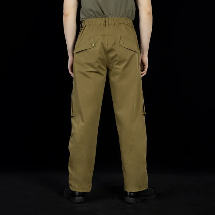 Back view of outdoor cargo pants featuring a reinforced seat area, secure back pockets, and a structured waistband for durability and support during outdoor use.
