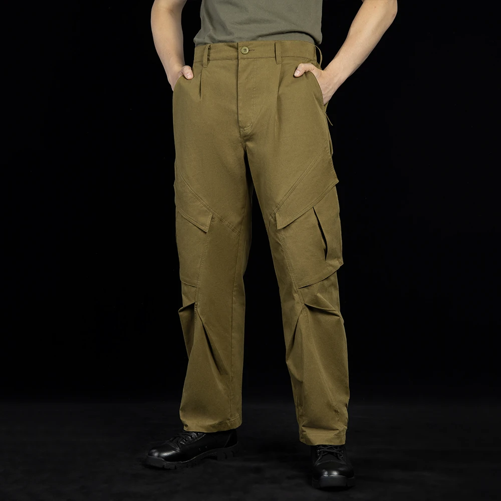 Outdoor cargo pants shown in full-length front-side view, featuring a straight fit, reinforced stitching, and functional cargo pockets for hiking, outdoor work, and tactical training.