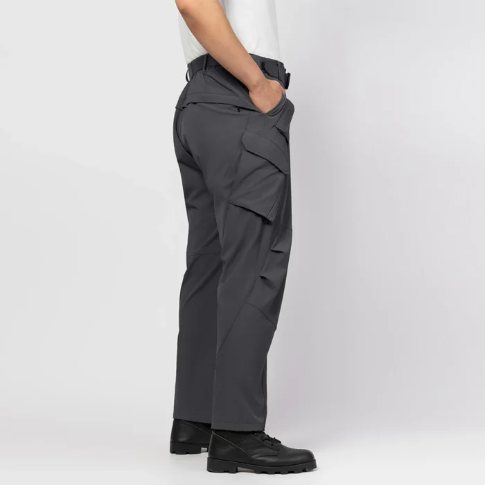 Detailed view of outdoor cargo pants side pocket with flap and hook-and-loop closure, designed for secure storage in outdoor, tactical, and workwear use.