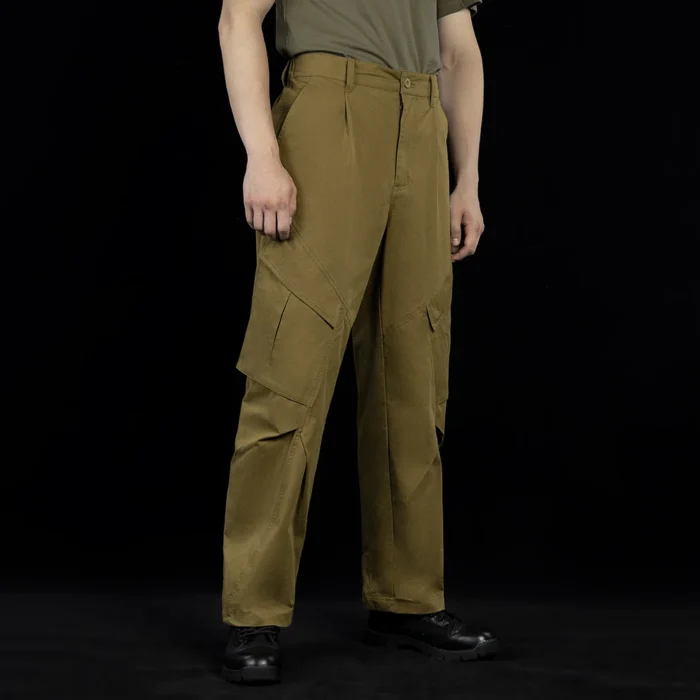 Side view of outdoor cargo pants highlighting ergonomic pocket placement, durable fabric construction, and a comfortable cut designed for outdoor activities and long wear.