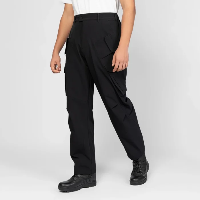 Front view of outdoor cargo pants highlighting functional cargo pockets, reinforced stitching, and clean tactical style suitable for outdoor activities and B2B distribution.