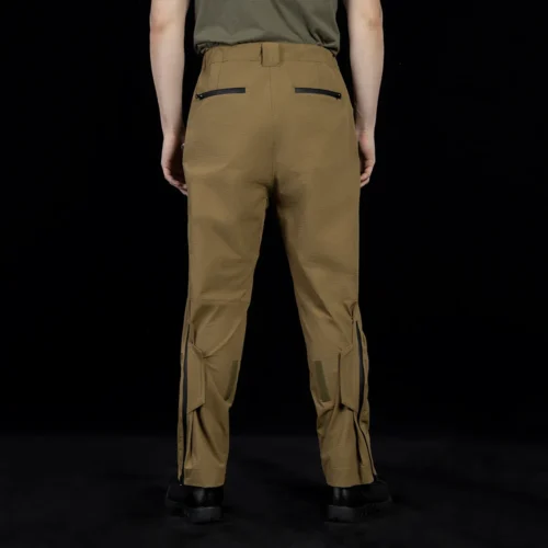 Back view of outdoor cargo pants featuring reinforced seat construction and secure rear zipper pockets, designed for durability, mobility, and professional outdoor use.
