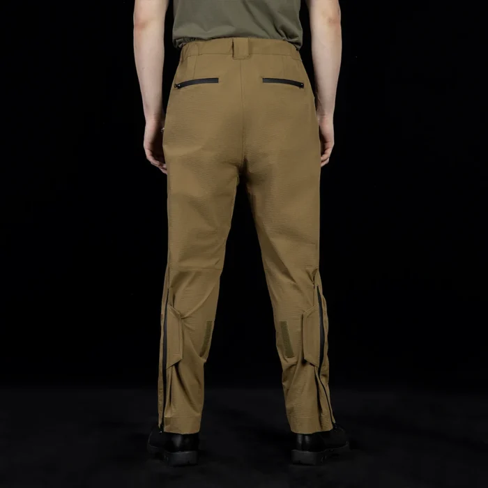 Back view of outdoor cargo pants featuring reinforced seat construction and secure rear zipper pockets, designed for durability, mobility, and professional outdoor use.