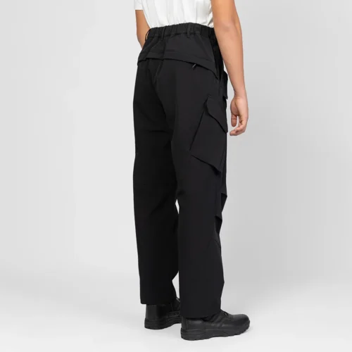 Back view of outdoor cargo pants featuring elastic waistband design for improved comfort and flexibility, ideal for long-term outdoor and workwear applications.