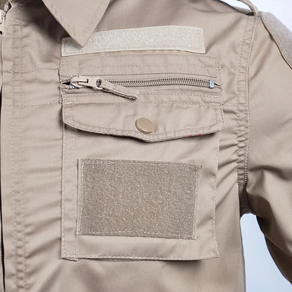Chest pocket construction with zipper and hook-and-loop ID panel for 728-style uniforms. Supports OEM customization for branding placement, pocket sizing, and durability stitching.