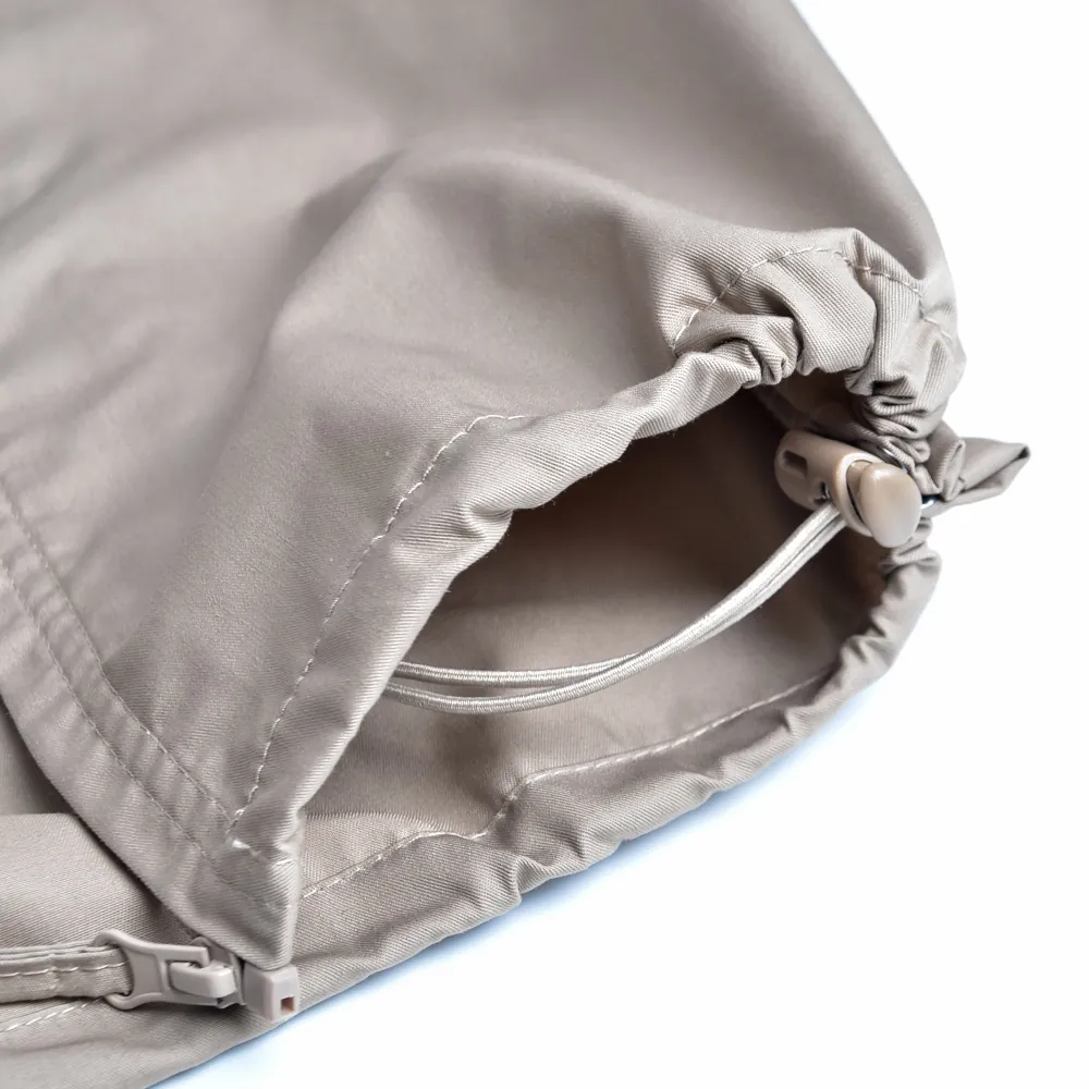 Close-up of adjustable pant hem drawcord and toggle for 728-style field uniform programs. Options include cord type, hardware, and stitching reinforcement for consistent OEM production.