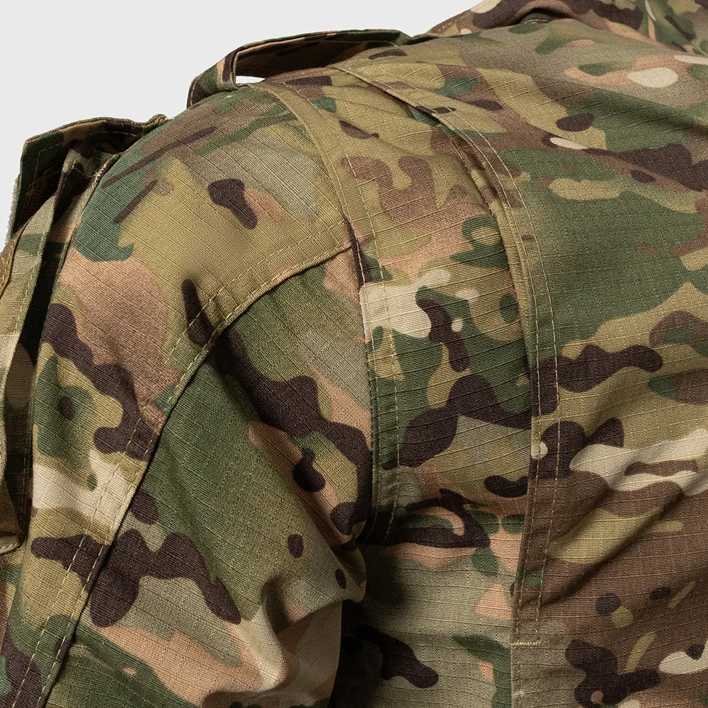 Shoulder seam and reinforcement detail for ACU-style uniform programs. Review construction methods, bartack points, and durability options for consistent large-scale production.