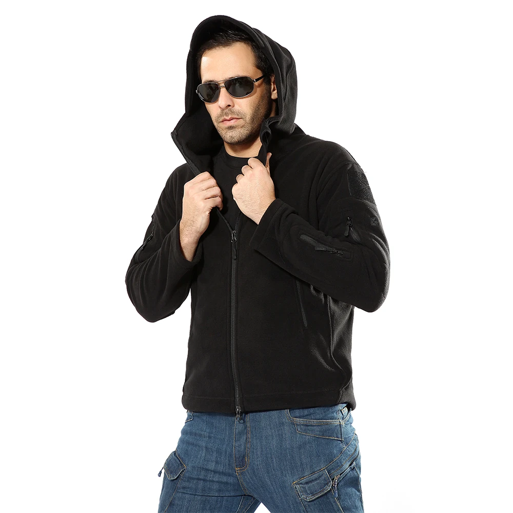 Front view of a black hooded tactical fleece jacket with multiple utility zip pockets and sleeve patch areas. Suitable for OEM/ODM programs requiring custom branding, sizing, and durable fleece construction.
