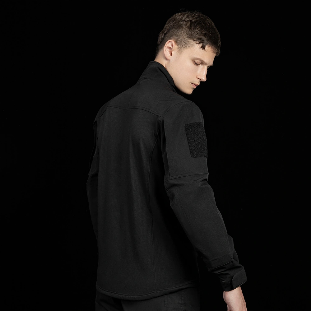Back view of black tactical training shirt showing overall fit and panel structure. OEM/ODM reference for program-based production, supporting size grading, stitching standards, and consistent bulk delivery.