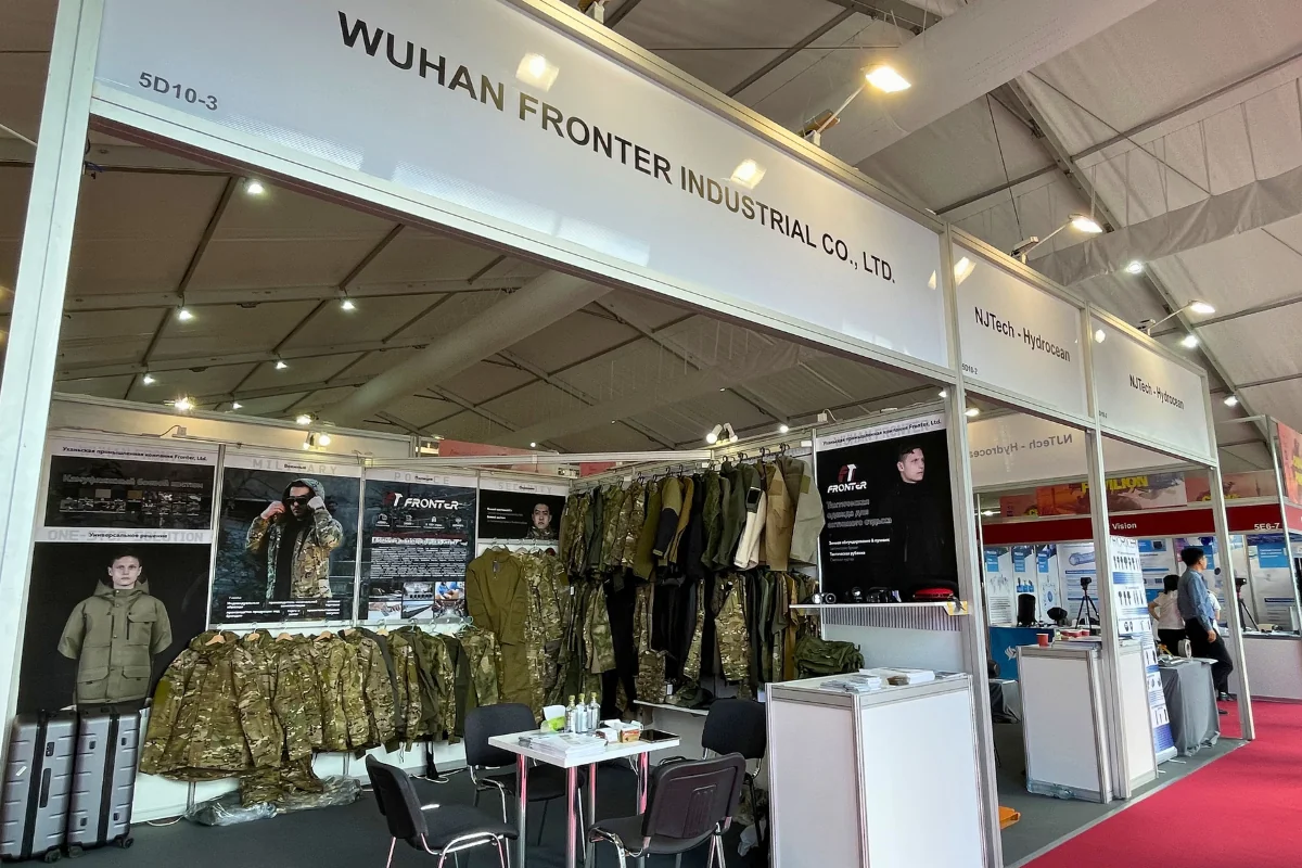 Wuhan Fronter Industrial Co. Ltd booth 5D10-3 at Army 2024 Russia displaying military and tactical uniforms